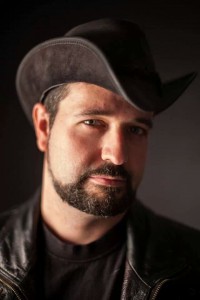 Chris, author portrait in hat